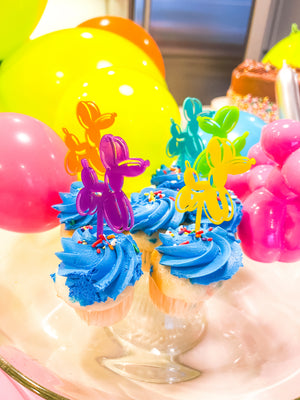 Balloon animal cupcake toppers for a tween or teen birthday party.