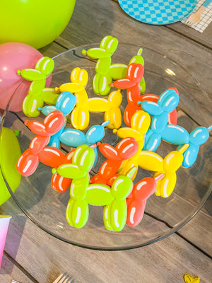 Bright-colored balloon animal cookies for a teen or tween birthday party.