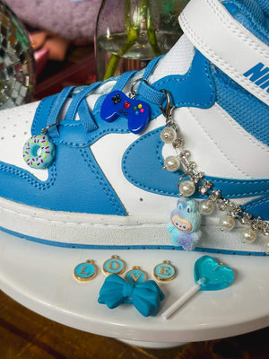 Birthday party favors or party activity ideas for tweens or kids parties, with a charm bar kit to decorate your shoes with sneaker charms.
