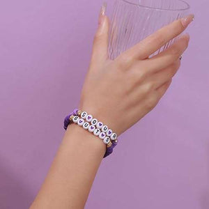 Olivia Rodrigo Guts charm bracelet kit and charm bar package used as an Olivia Rodrigo party activity, party favor, or craft idea.