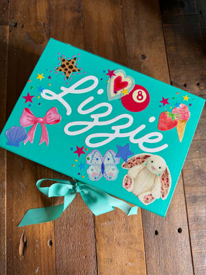 A party favor or party activity for tweens or kids with custom sticker pages featuring 8-ball stickers, jelly cat stickers, and seashell stickers to decorate your own memento box.