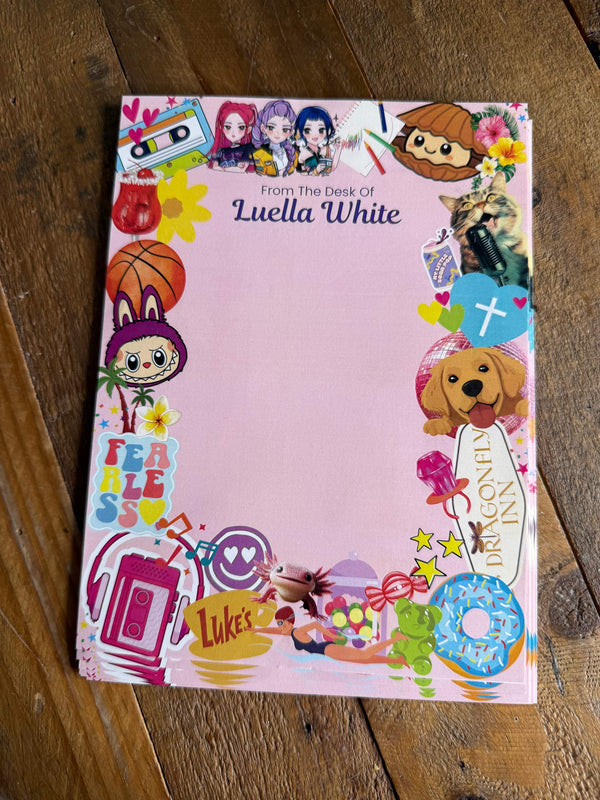 A party favor or party activity for tweens or kids with custom sticker pages featuring huntrix stickers, puppy stickers, and doughnut stickers to decorate your own stationary.