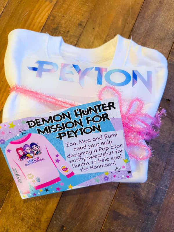 Patches and decorations for a sweatshirt patch party activity or party favor for a kpop demon hunters birthday party for tweens or kids.