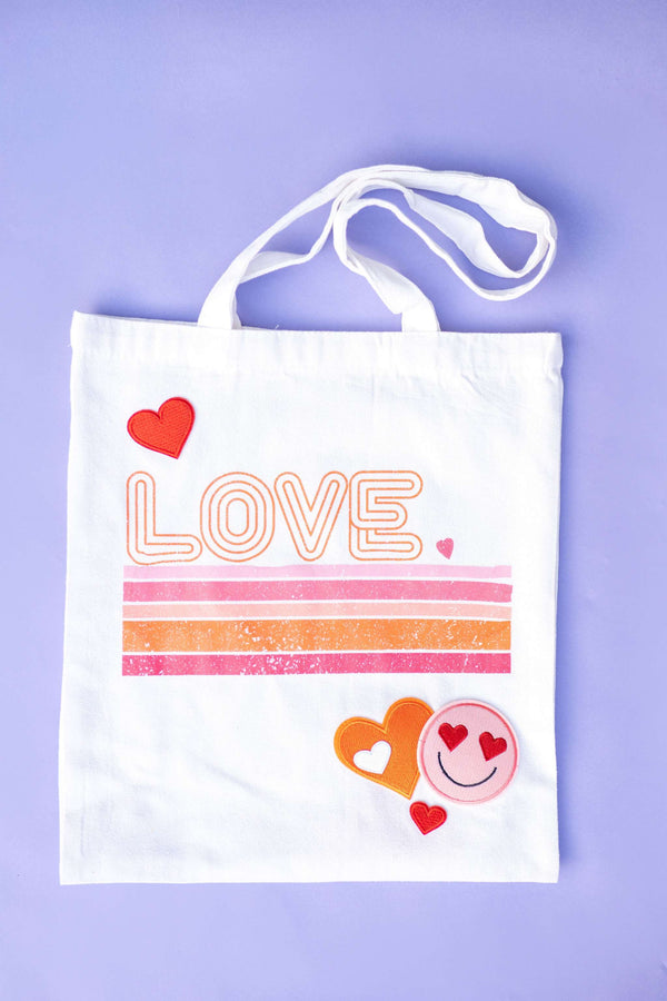 Birthday party favors or party activity ideas for tweens or kids parties, with a patch bar kit to decorate your own book bag or customizable tote bag party favor.