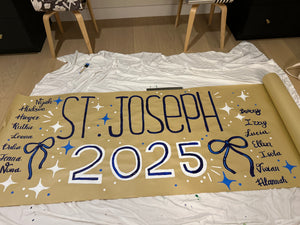 Hand-painted custom graduation party banner with hand-lettering for a graduation party.