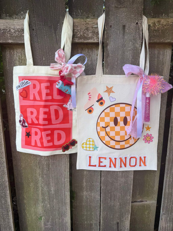 A decorate your own book bag patch bar kit for a Taylor Swift birthday party with Swiftie patches.