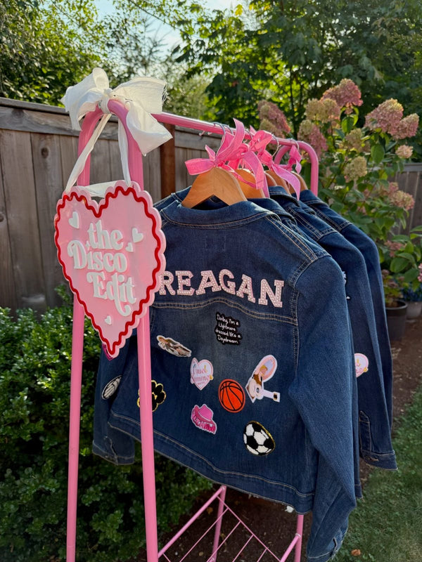 A craft idea for a kids party, featuring a decorate your own jean jacket party activity idea with customizable patches for a teen or tween birthday party favor.