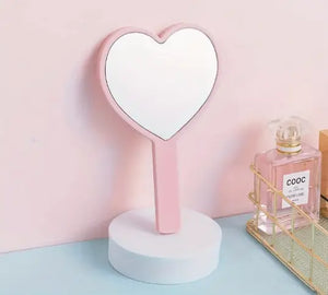 Custom Heart Handheld pink Mirror party favor or party activity idea for kids, tweens, or teens.