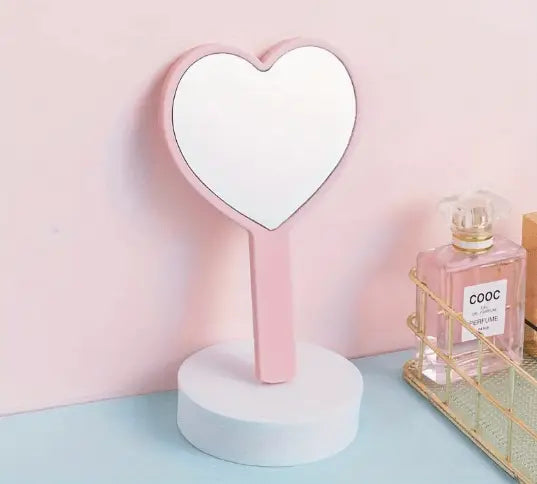 Custom Heart Handheld pink Mirror party favor or party activity idea for kids, tweens, or teens.