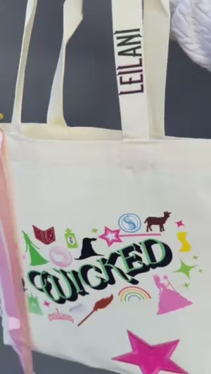 Customizable book bag party favors for Wicked themed birthday party for teens, tweens, or kids.