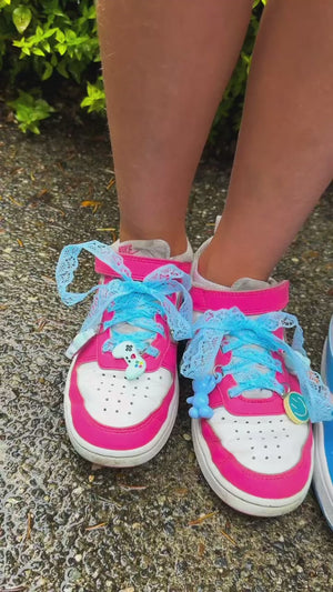 A tennis shoe charm bar party activity or party favor idea with DIY sneaker charms for tweens or kids.
