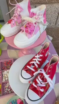 A charm bar party activity or party favor idea with DIY customizable charms for tweens or kids to make personalized keychains or tennis shoe charms. 