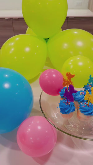 Balloon animal themed party decor, cupcake toppers, and balloon garland kits for a party for teens, tweens, or kids.