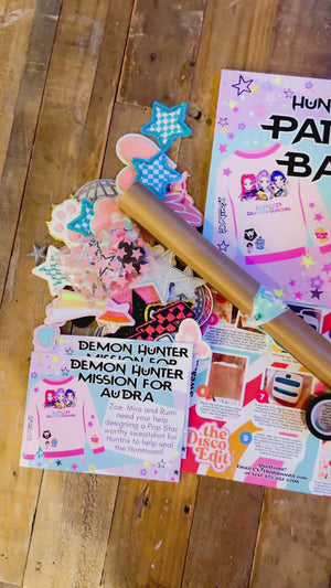 Patches and decorations for a sweatshirt patch party activity or party favor for a kpop demon hunters birthday party for tweens or kids.