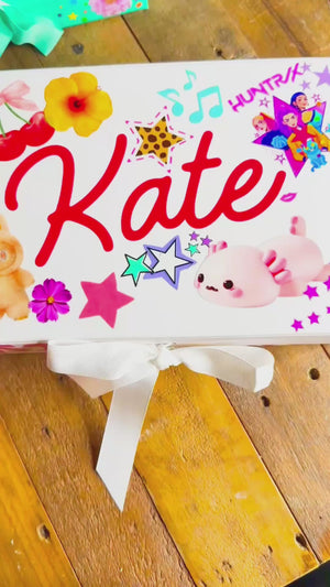 A party favor or party activity for tweens or kids with custom sticker pages featuring huntrix stickers, and fun kids stickers to decorate your own memento box.